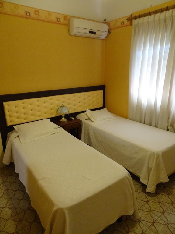 Mon Petit Hotel Villa Carlos Paz Værelse billede